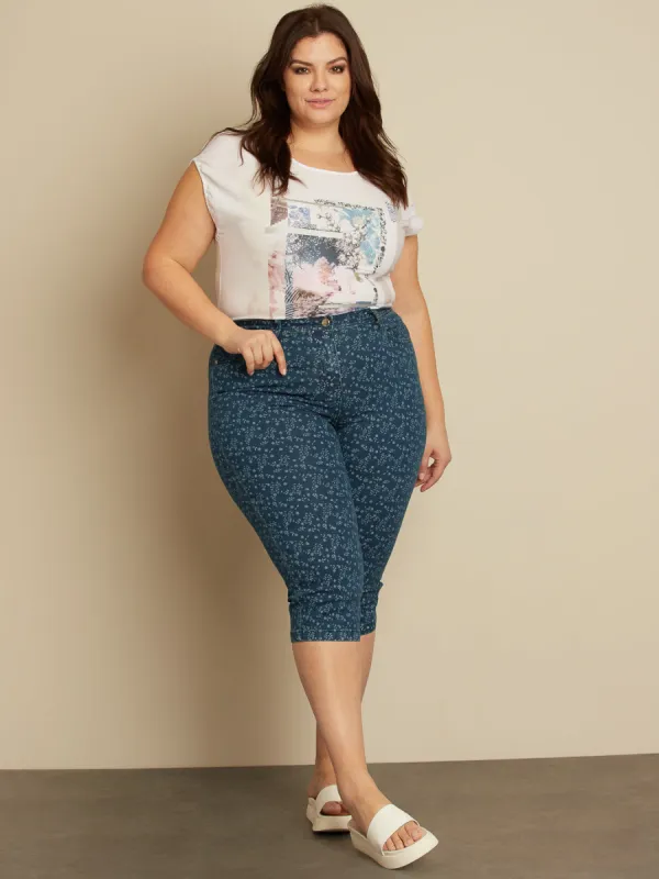 Straight semi-fitted pull-on denim capri sold by Claire France