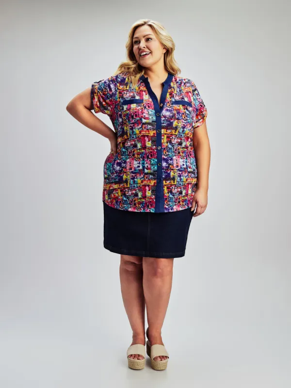 Short-sleeve semi-fitted blouse with buttons sold by Claire France