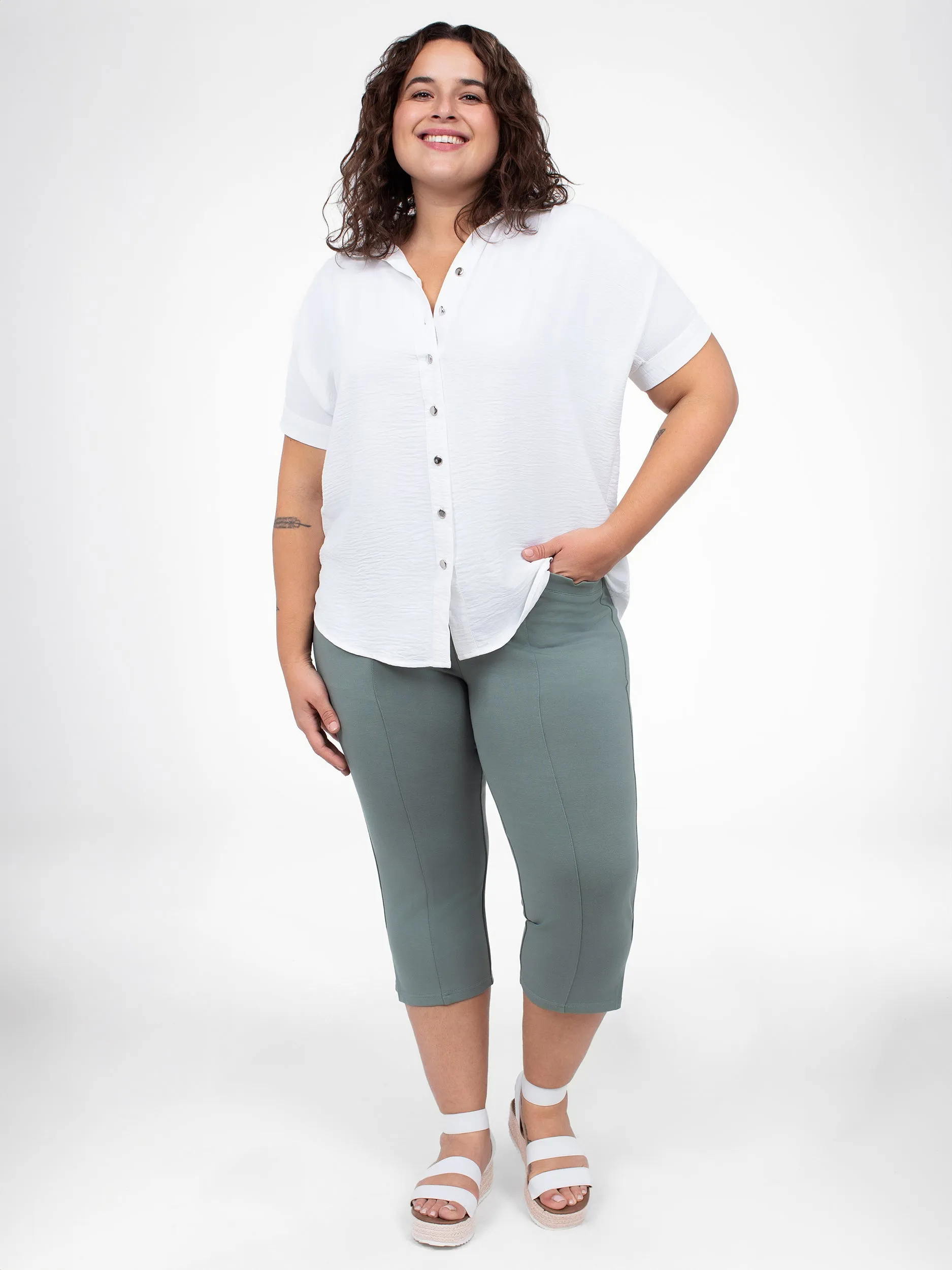 Short-sleeve loose blouse sold by Claire France