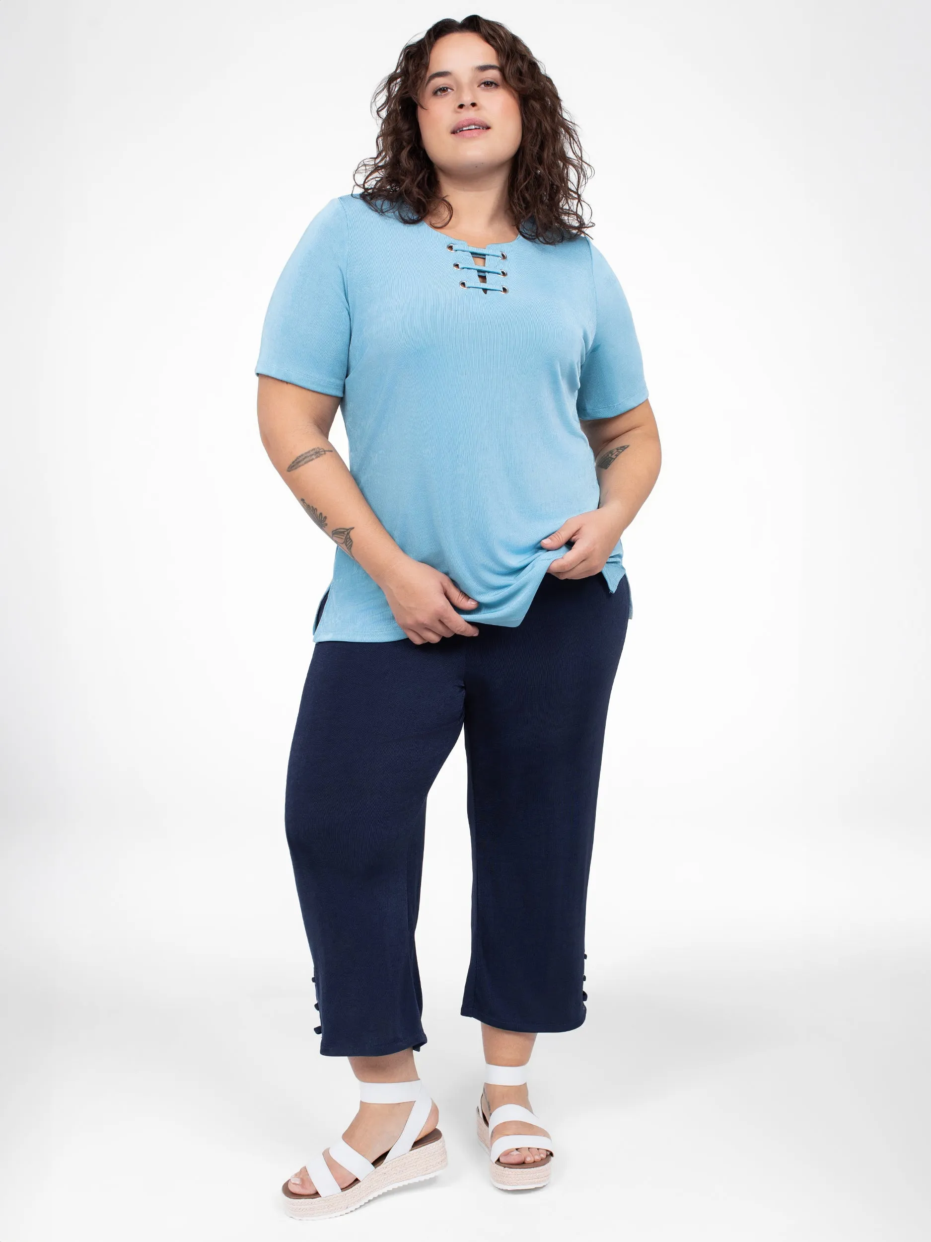 Short-sleeve semi-fitted tunic sold by Claire France