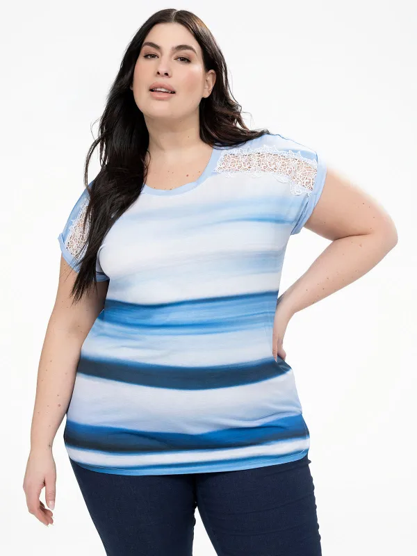 Short-sleeve loose tunic sold by Claire France