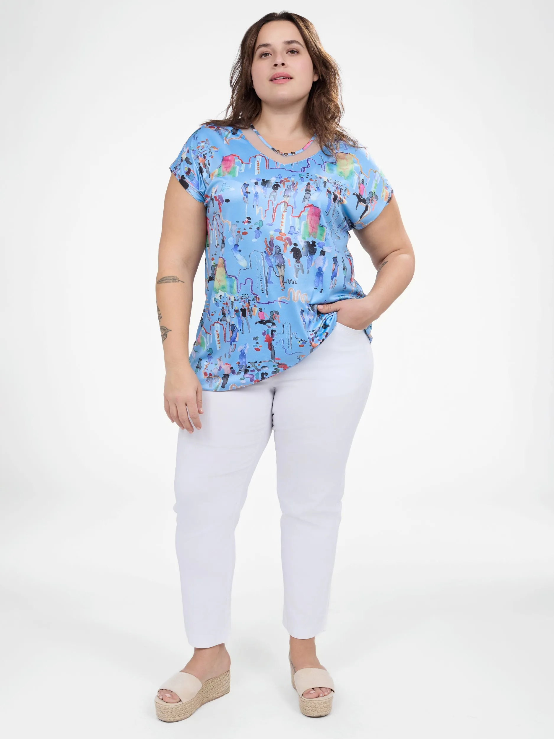 Short-sleeve flared tunic sold by Claire France