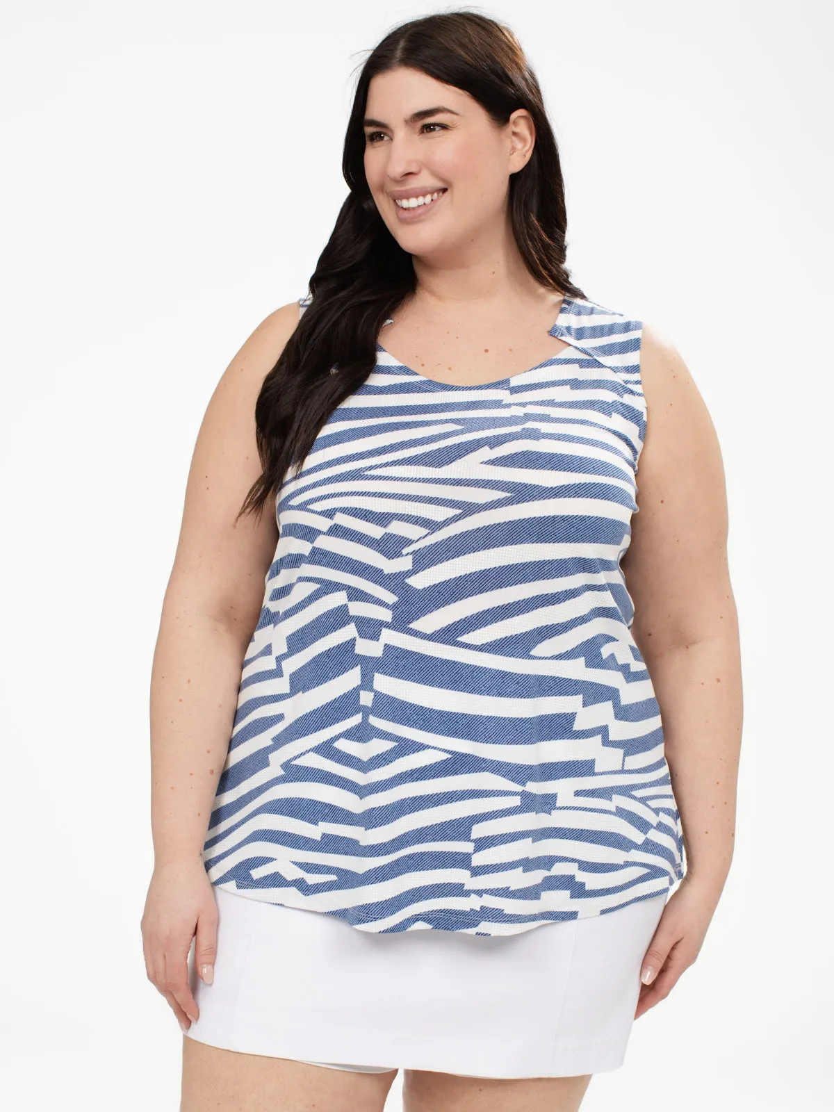 Sleeveless flared tunic sold by Claire France