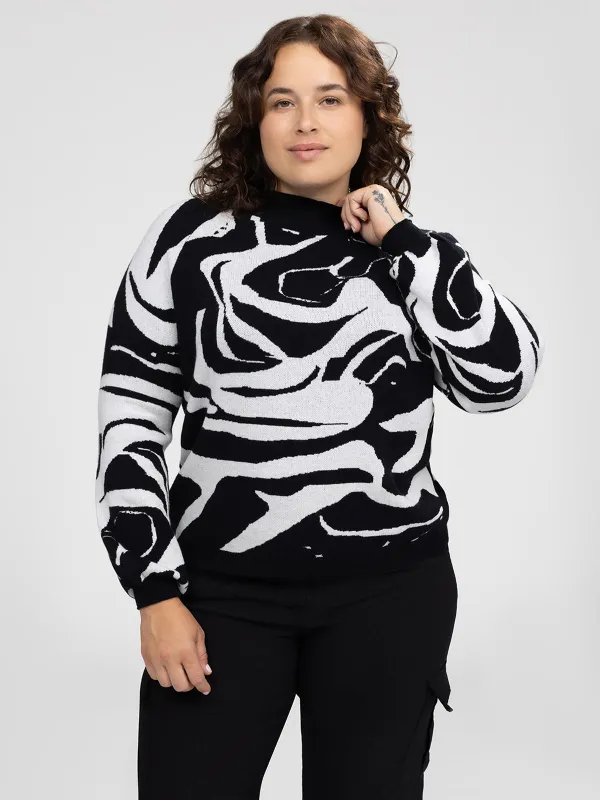 Long-sleeve loose pullover sweater sold by Claire France