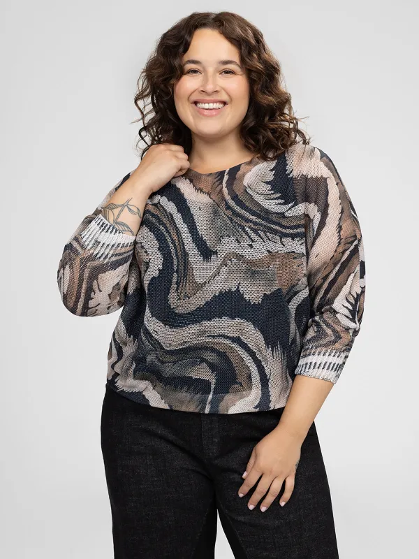 Long-sleeve loose pullover sweater sold by Claire France