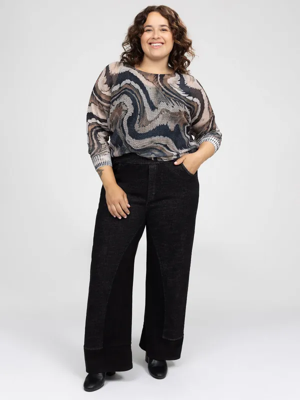 Loose denim pants sold by Claire France