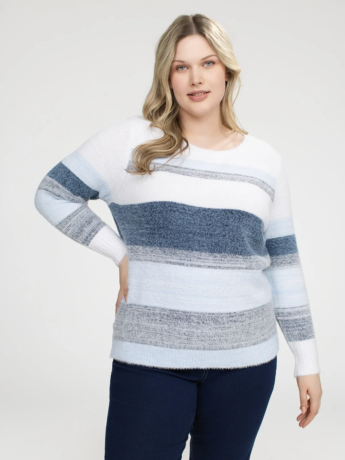 Long-sleeve semi-fitted pullover sweater sold by Claire France