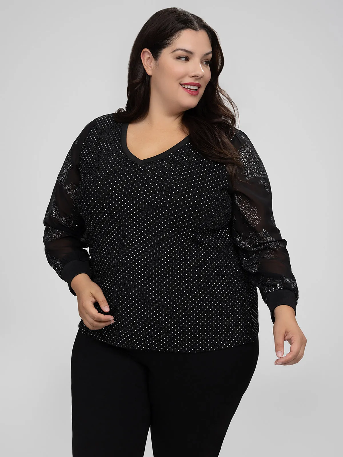 Long-sleeve flared tunic sold by Claire France