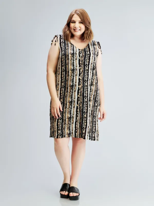 Sleeveless semi-fitted tunic with buttons sold by Claire France