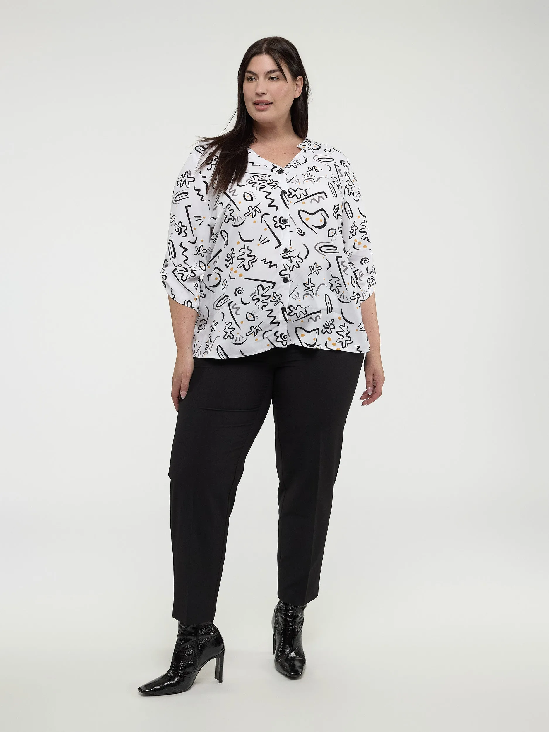 Long-sleeve semi-fitted blouse with buttons sold by Claire France