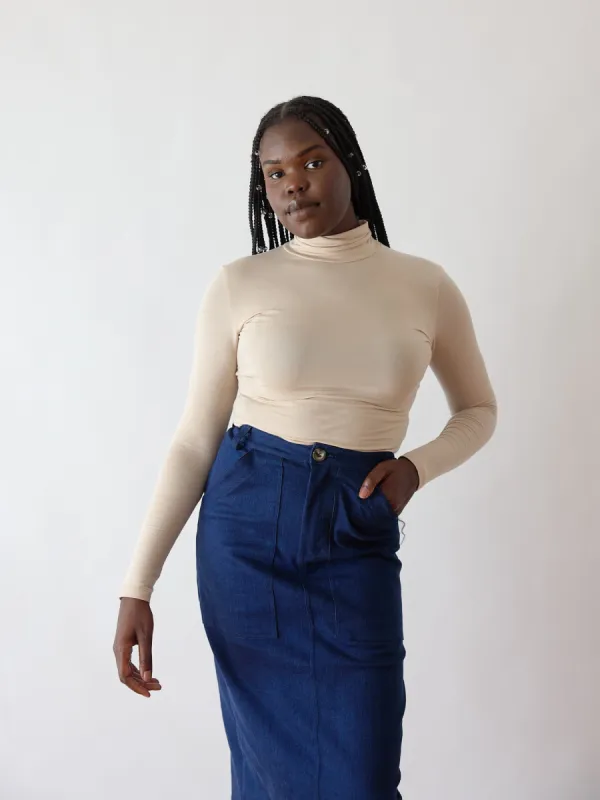 BEIGE LINDSEY TURTLENECK sold by Free Label