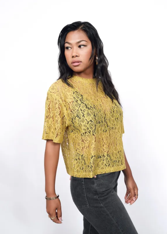 The Empower Lace Boxy Blouse sold by WILDFANG