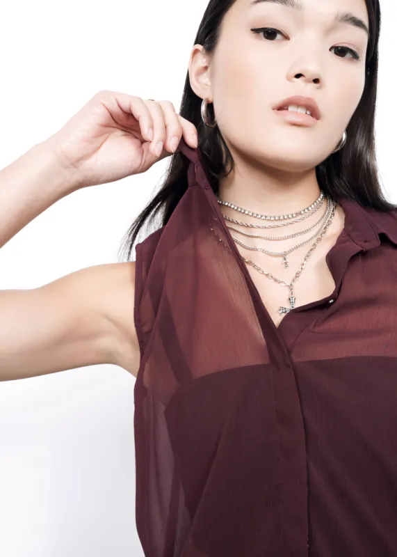 The Empower Sheer Sleeveless Button Up sold by WILDFANG