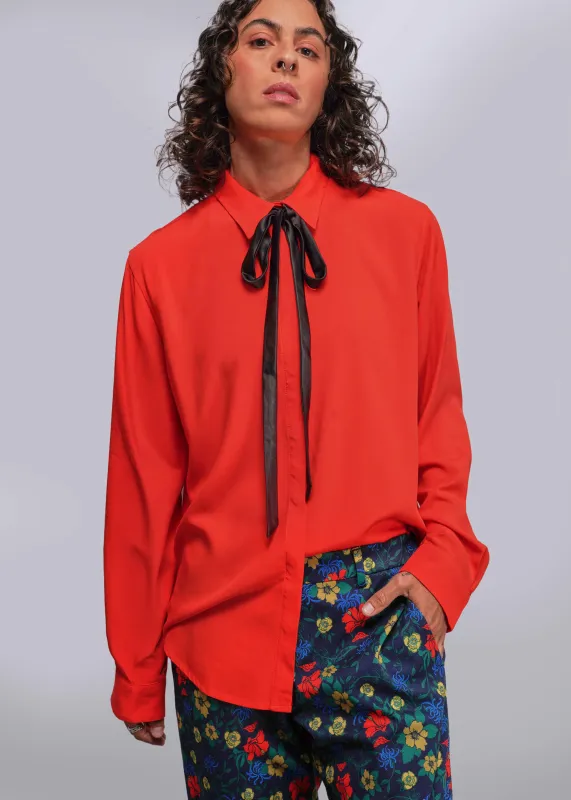 The Empower Long Sleeve Bow Button Up sold by WILDFANG