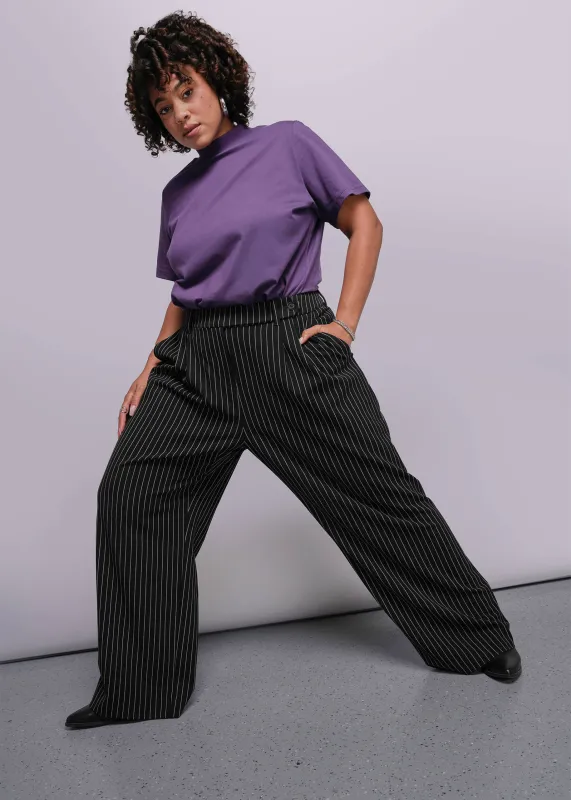 The Empower Pinstripe Wide Leg Trouser sold by WILDFANG
