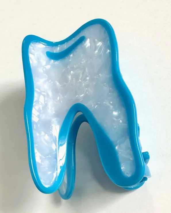 Wisdom Tooth Hair Claw sold by Nooworks