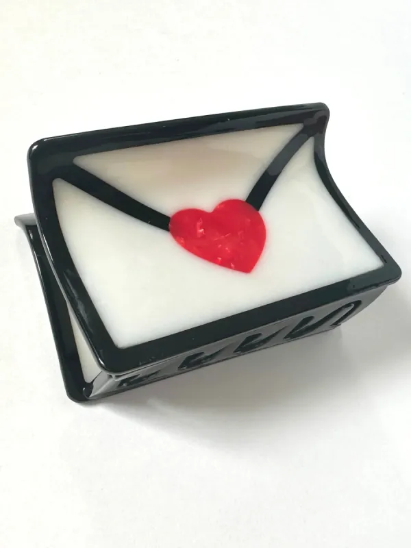 Love Letter Claw sold by Nooworks