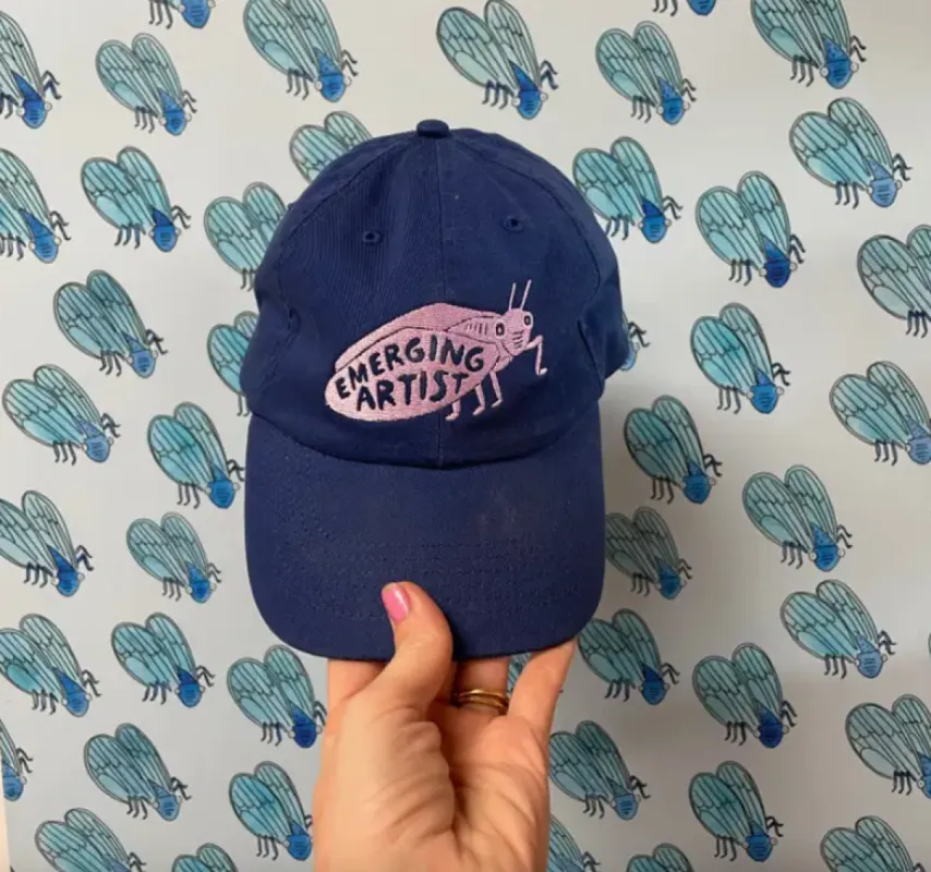 Emerging Artist Hat sold by Nooworks