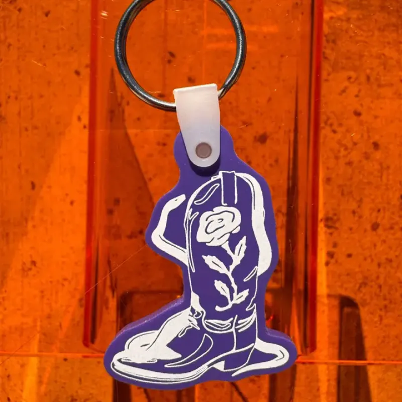Purple Boot Keychain sold by Nooworks
