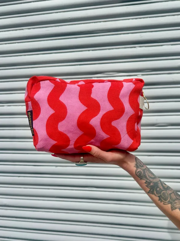 The Dopp Bag Pink Squiggle sold by Nooworks