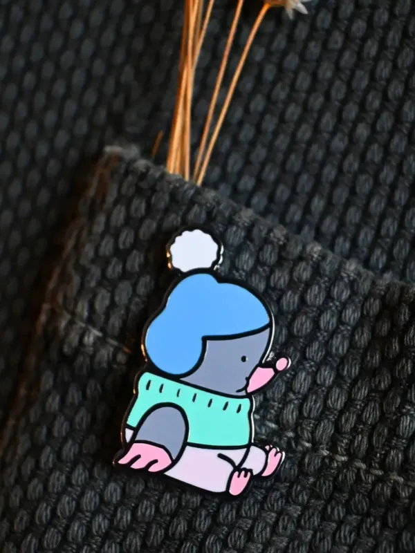 Mole-Idays Pin sold by Nooworks