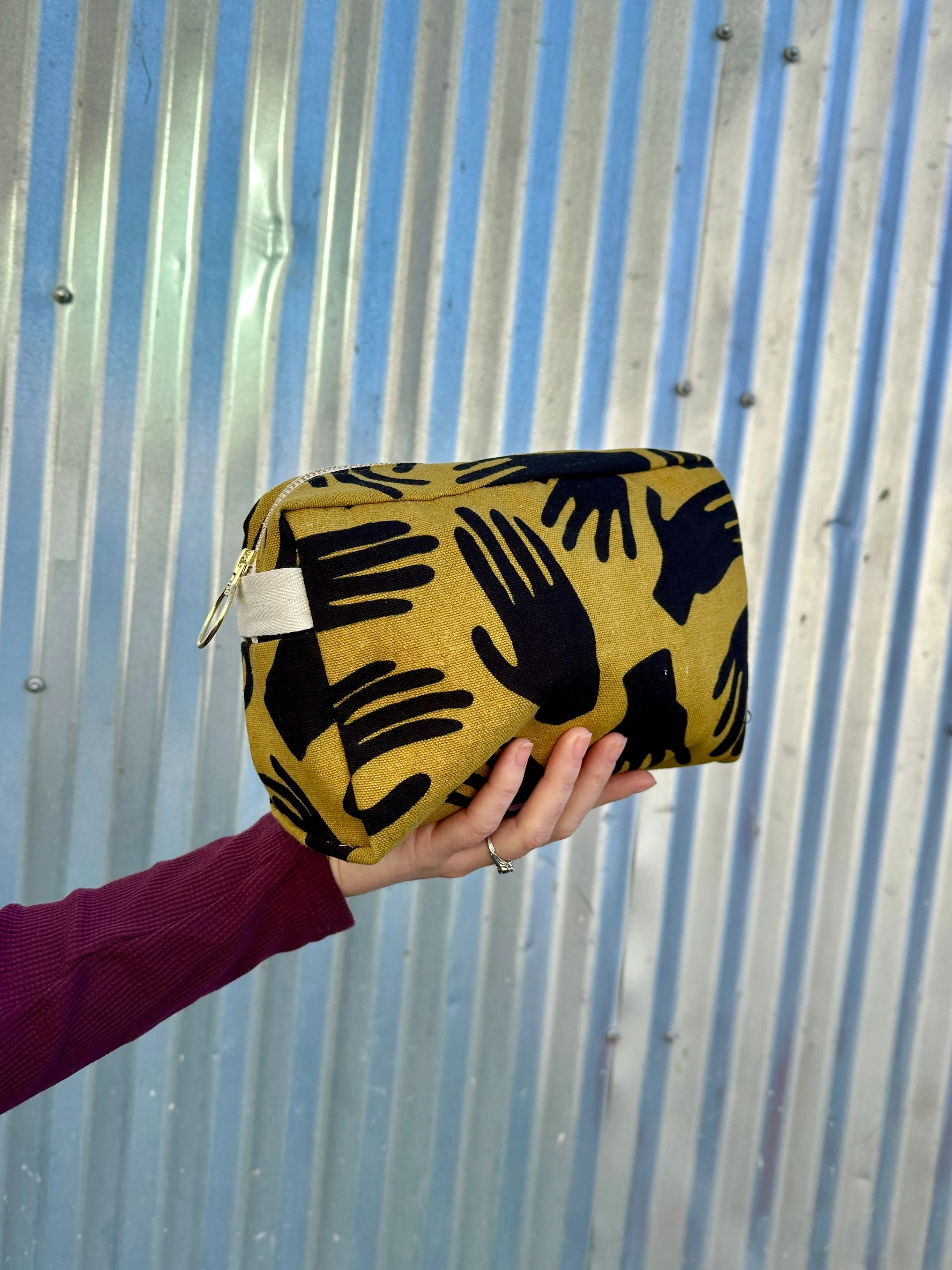 The Dopp Bag Hands sold by Nooworks