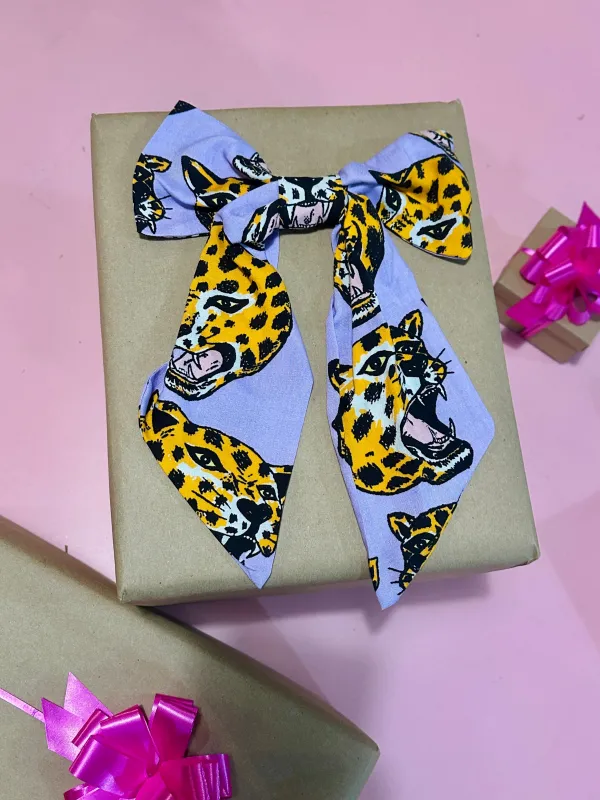 Patchouli Nomad x Nooworks Giant Bows- Cheetah head sold by Nooworks