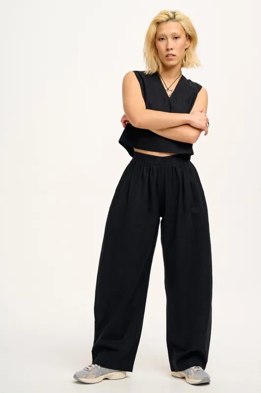 Freddie - Barrel Leg Cotton & Linen Trousers in Black sold by Lucy & Yak