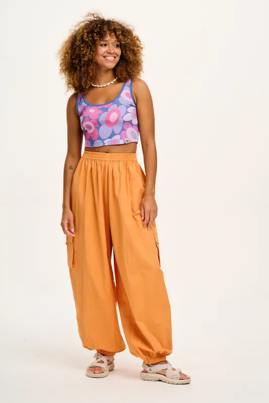 Rumi - Cargo Cotton Trousers in Sunset Orange sold by Lucy & Yak