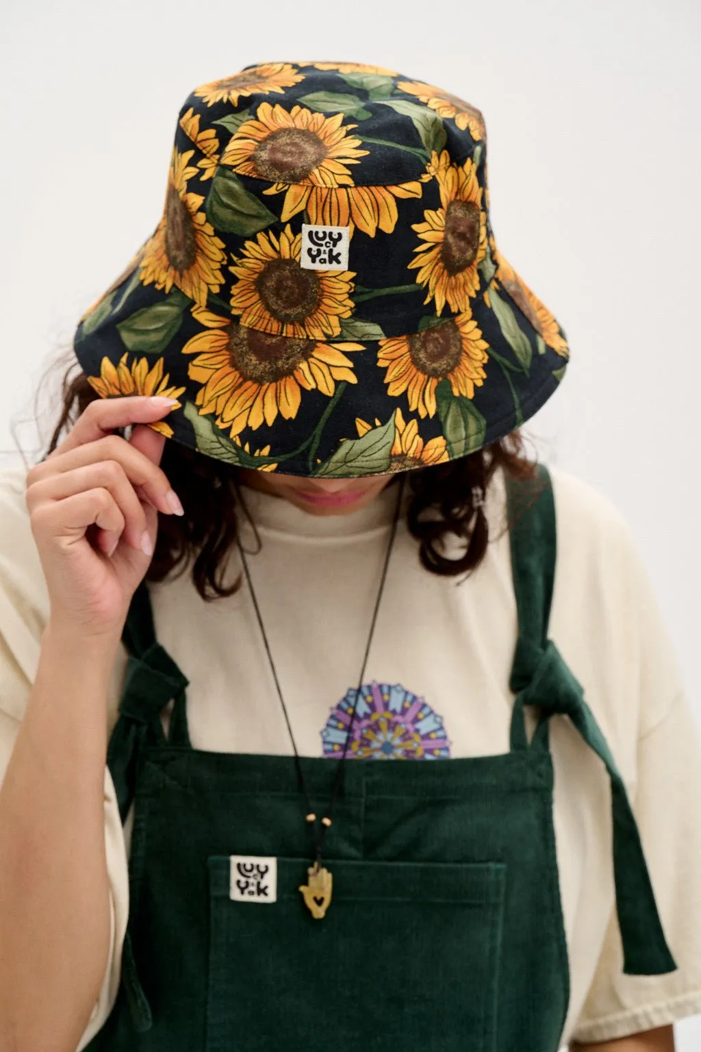 Travis - Reversible Cotton Bucket Hat in Sunflower Print & Black sold by Lucy & Yak product image thumbnail 4