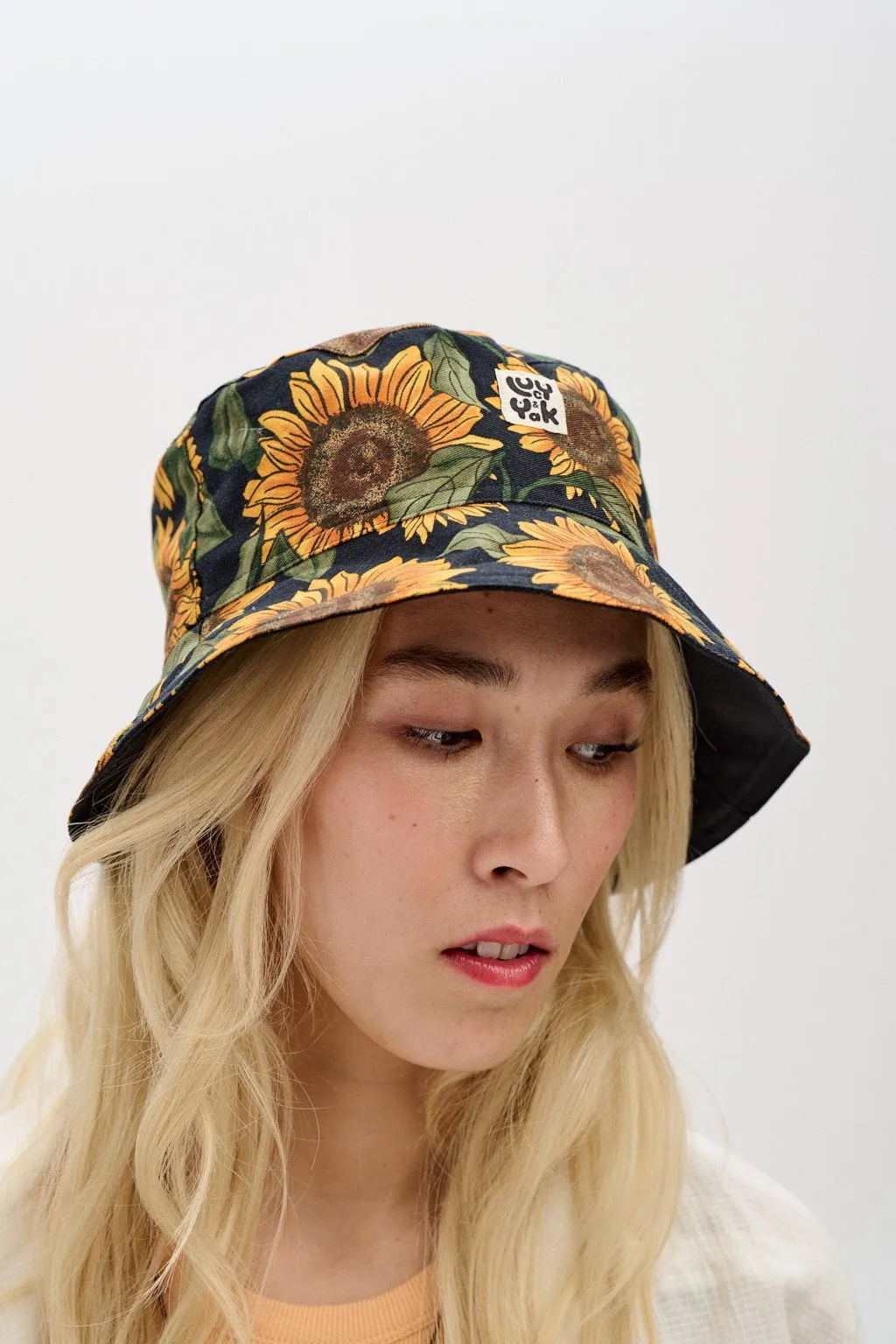 Travis - Reversible Cotton Bucket Hat in Sunflower Print & Black sold by Lucy & Yak product image thumbnail 5