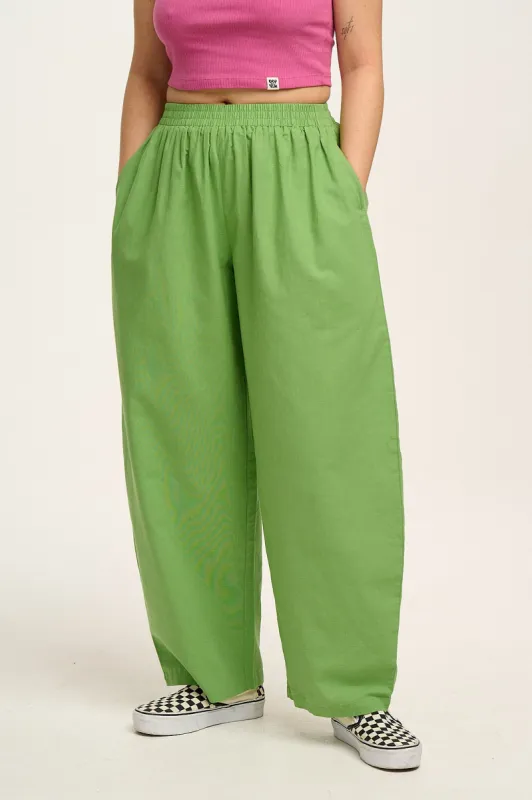 Freddie - Balloon Cotton & Linen Trousers in Matcha Green sold by Lucy & Yak