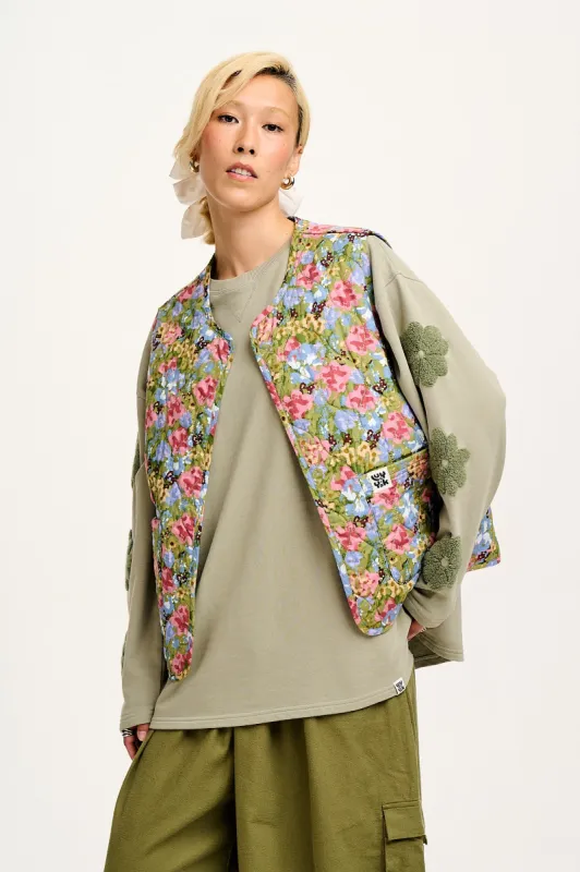 Emery - Reversible Quilted Gilet in Elsinore Floral Print sold by Lucy & Yak
