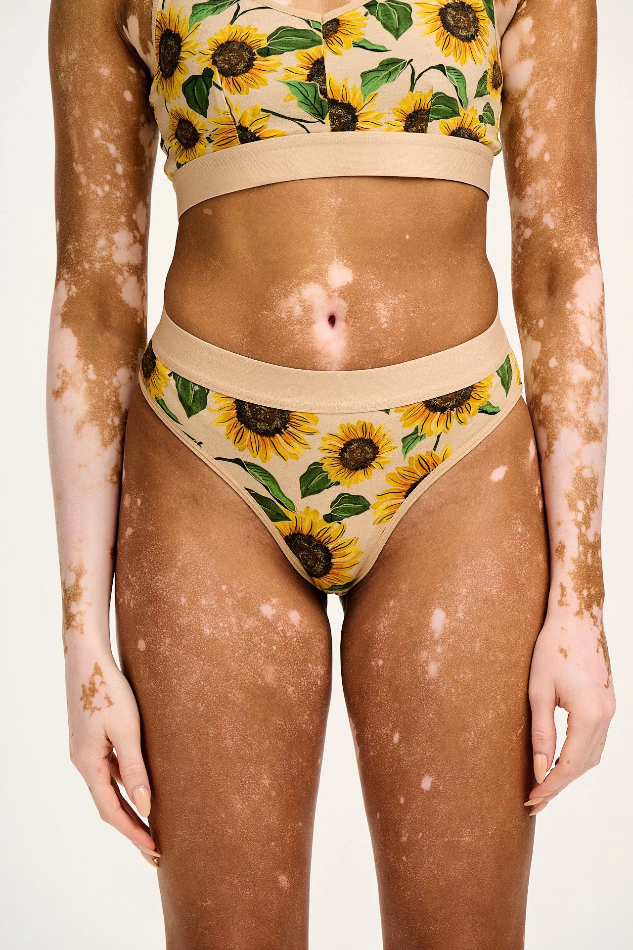 Cora - Cotton & Bamboo Bikini Pant in Cream Sunflower Print sold by Lucy & Yak