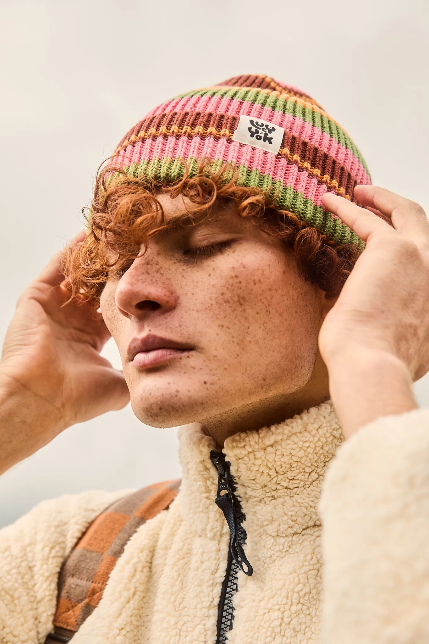 Luca - Knitted Cotton Beanie in Orange Stripe sold by Lucy & Yak