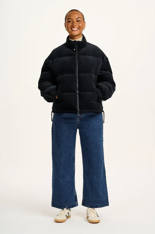 Paloma - Corduroy Puffer Jacket in Black sold by Lucy & Yak