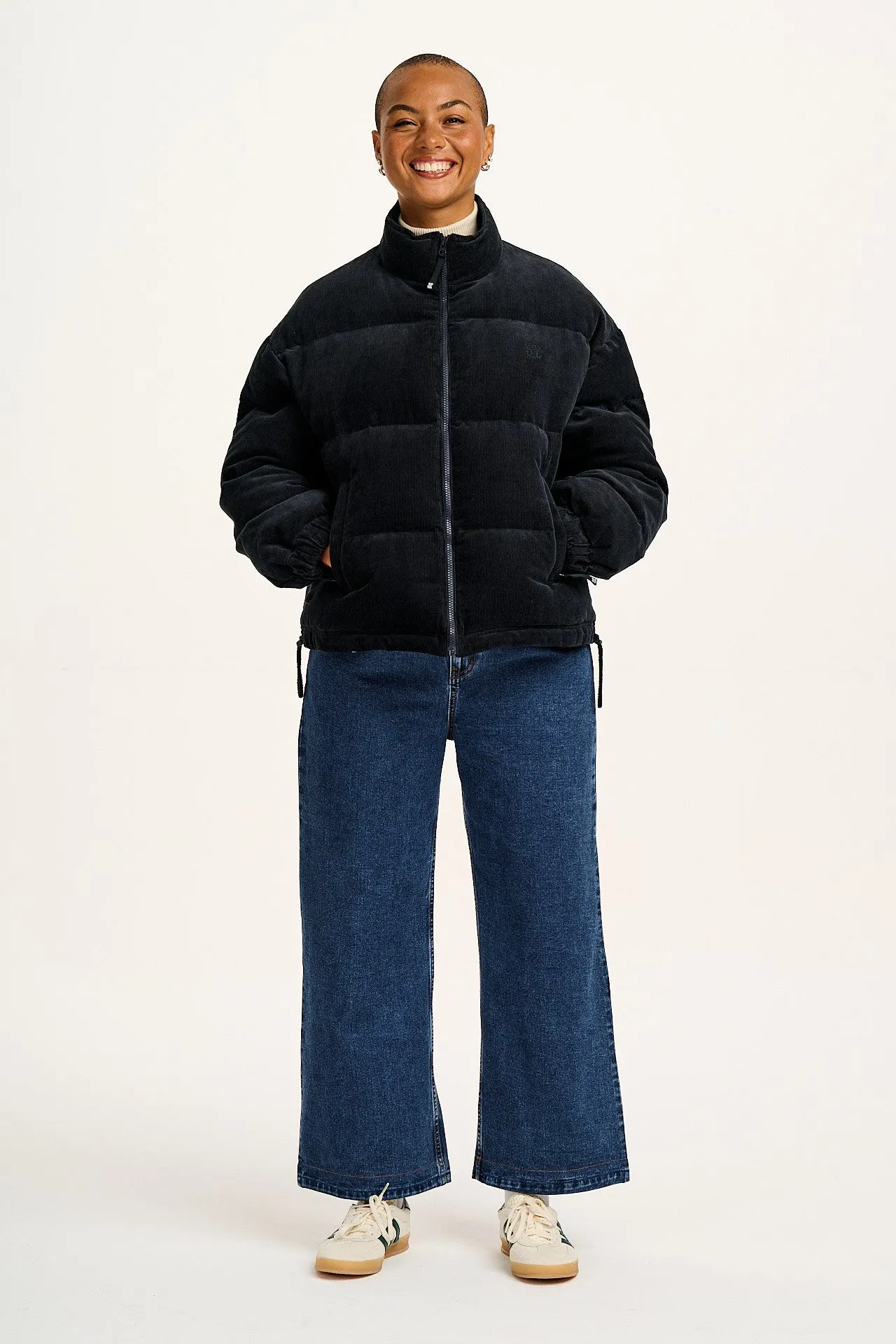 Paloma - Corduroy Puffer Jacket in Black sold by Lucy & Yak