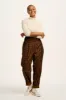 Alexa - Cotton Trousers in Brown Penny Patchwork Print sold by Lucy & Yak