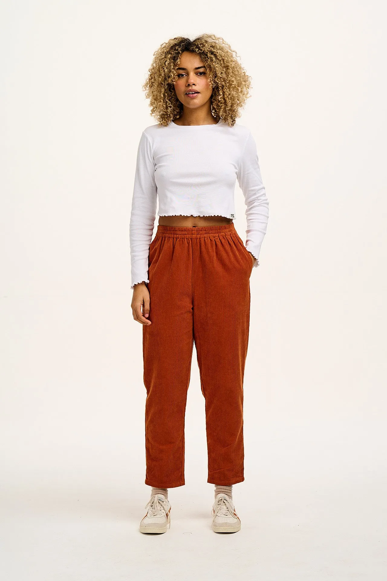 Billie - Corduroy Trousers in Red Clay sold by Lucy & Yak