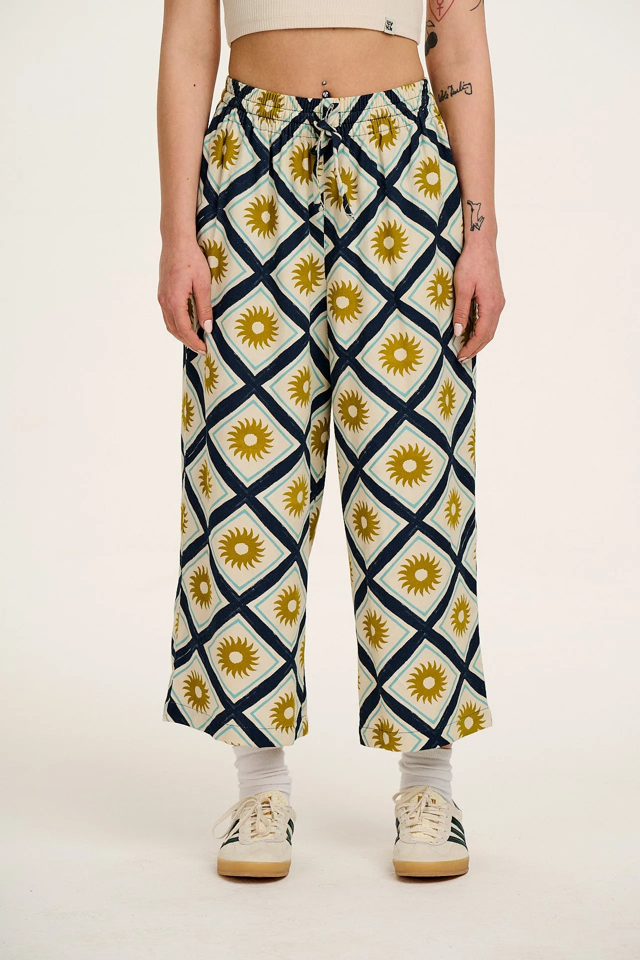 Chuck - Wide Leg Cotton Trousers in Ecru Cosmo Print sold by Lucy & Yak