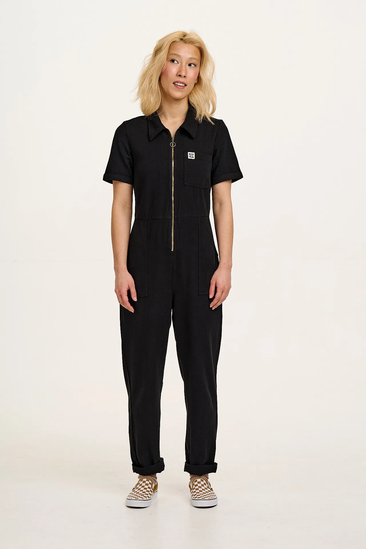 Rex - Short Sleeve Cotton Jumpsuit in Black sold by Lucy & Yak