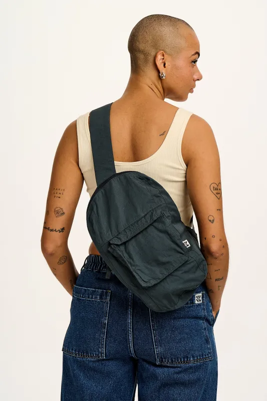 Dora - Cotton Crossbody Backpack in Midnight Black sold by Lucy & Yak