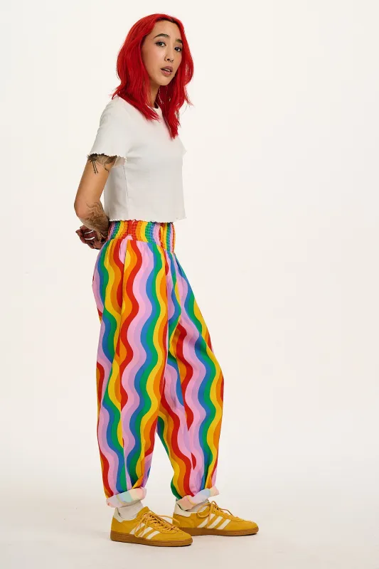 Alexa - Cotton Trousers in Wavy Rainbow Print sold by Lucy & Yak