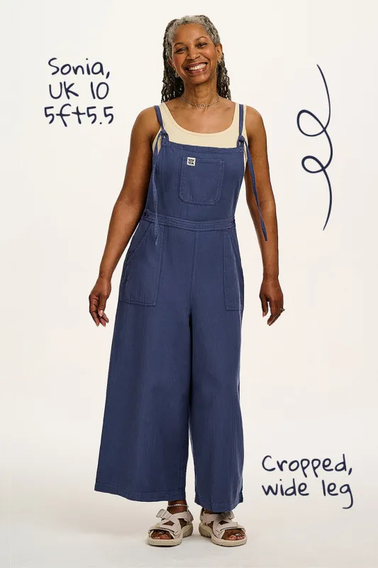 River - Cropped Cotton Dungarees in Indigo sold by Lucy & Yak