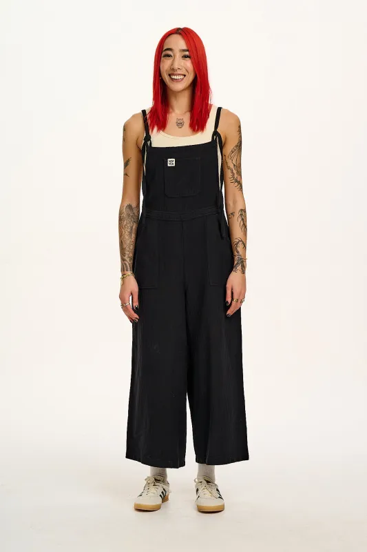 River - Cropped Cotton Dungarees in Black sold by Lucy & Yak