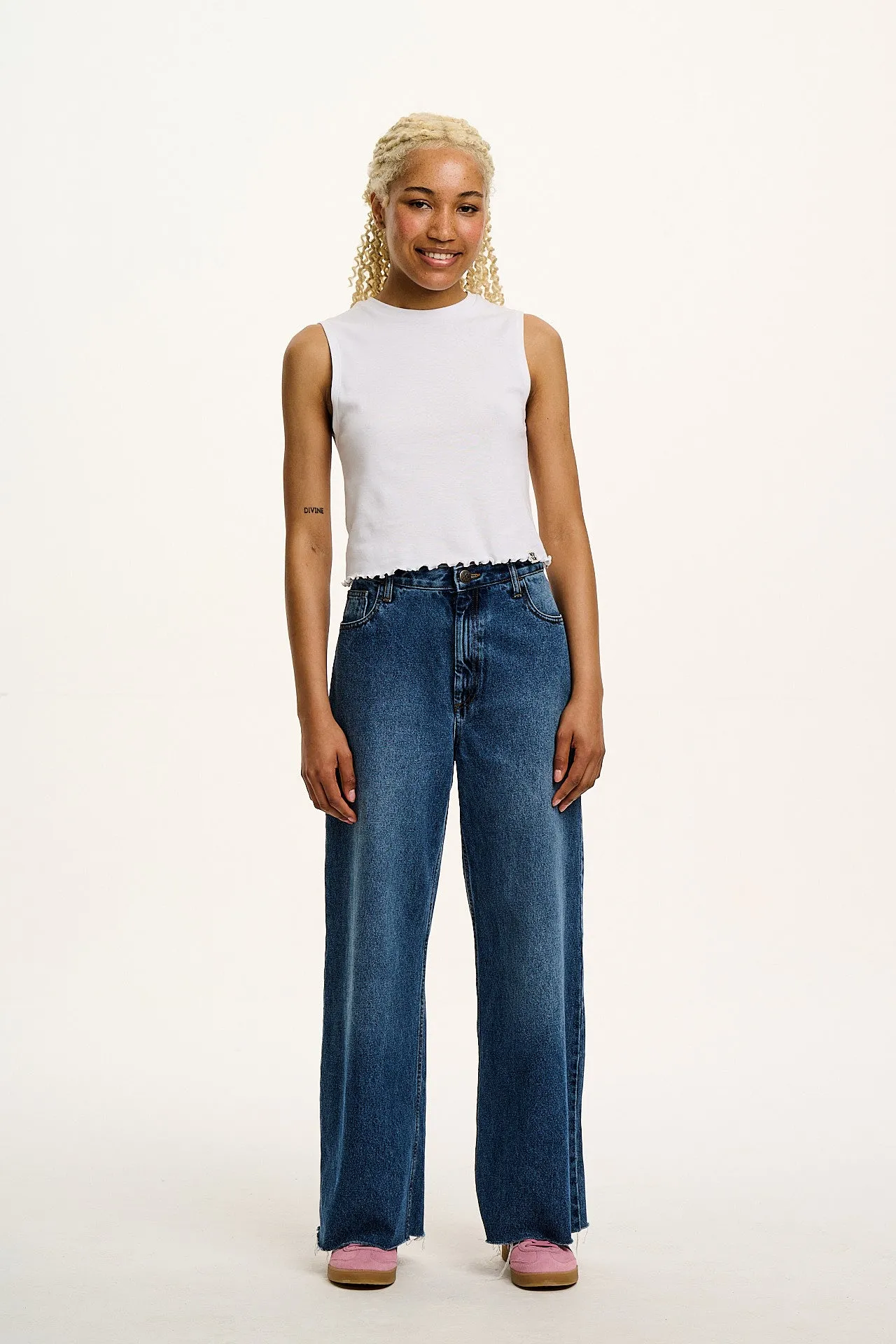 Etta - Sleeveless Cotton Tee in White sold by Lucy & Yak