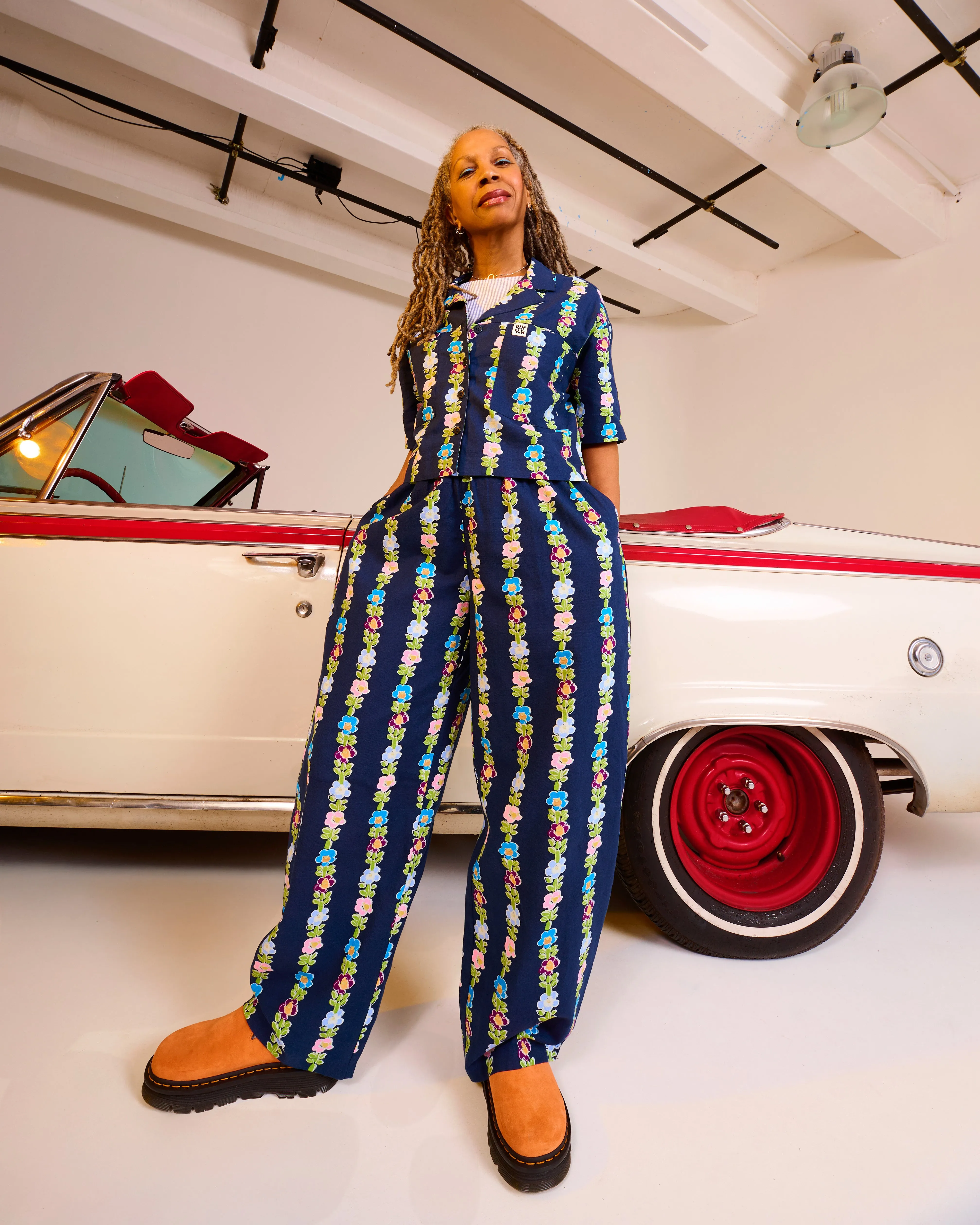 Freddie - Barrel Leg Cotton & Linen Trousers in Navy Island Bloom Print sold by Lucy & Yak