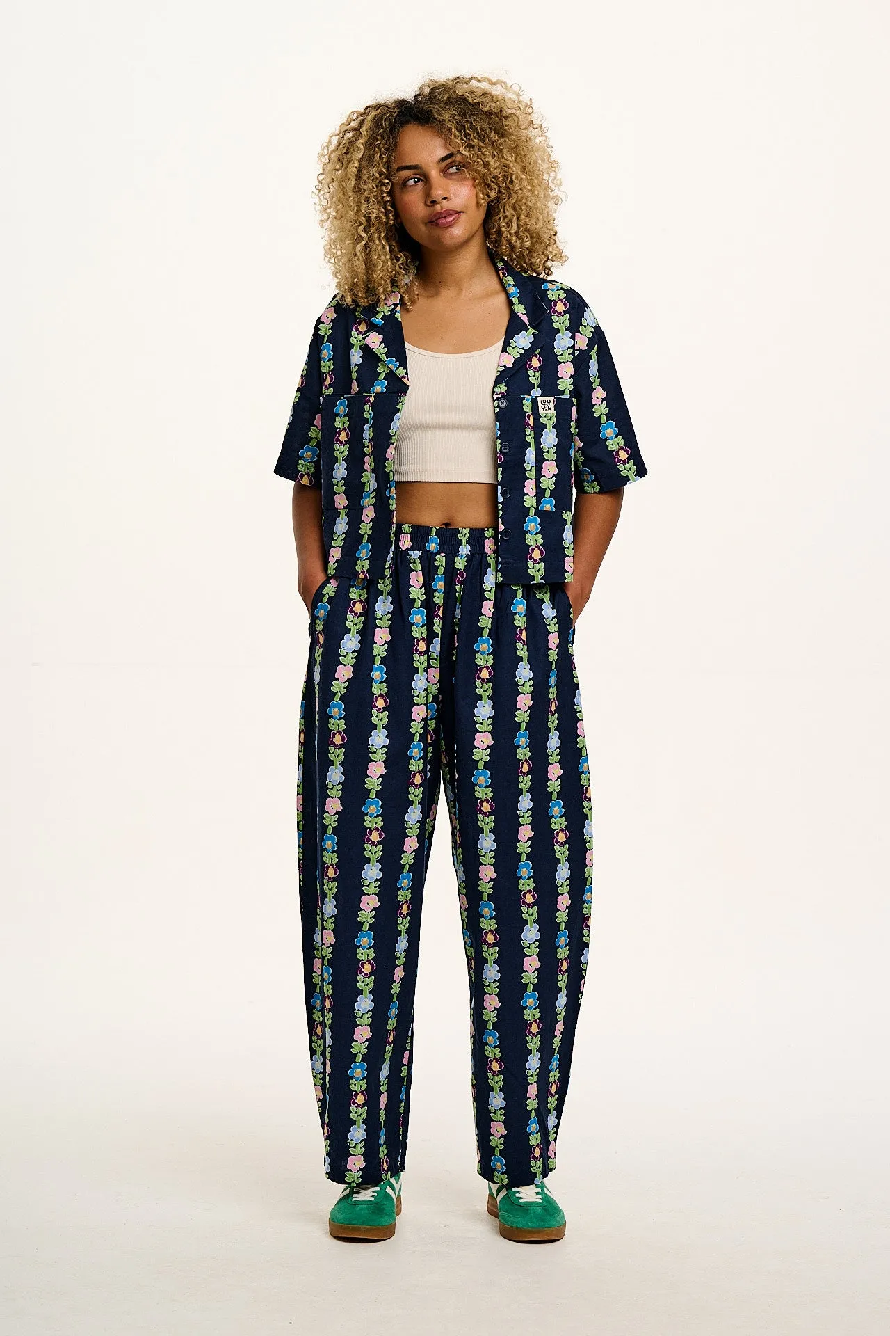 Freddie - Barrel Leg Cotton & Linen Trousers in Navy Island Bloom Print sold by Lucy & Yak product image thumbnail 2