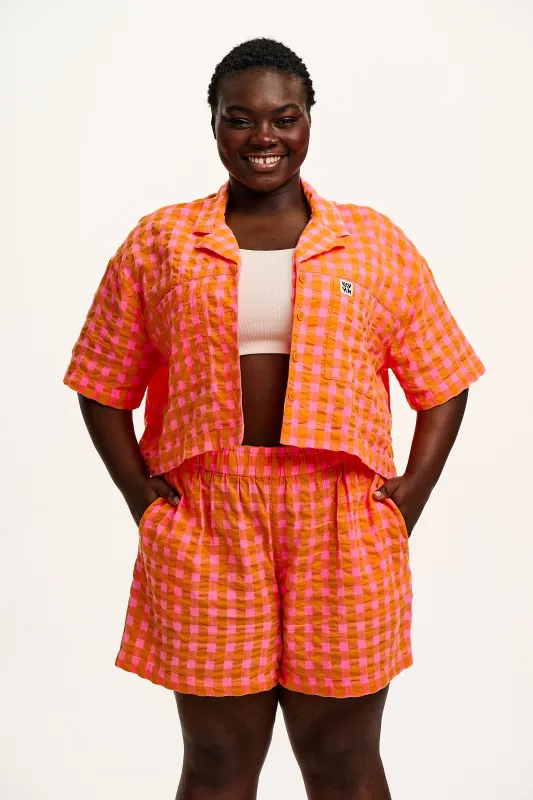 Alfie - Cotton Seersucker Shirt in Pink & Orange Gingham sold by Lucy & Yak