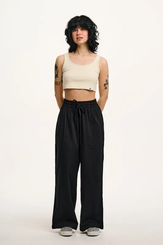 Norris - Cotton Trousers in Black sold by Lucy & Yak